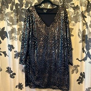 Formal black and gray sequin dress.  Mid-length.